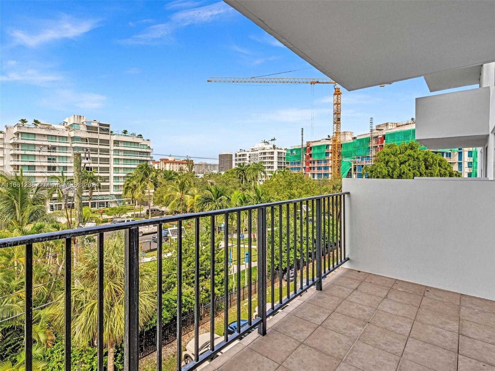 a view of a balcony with city view