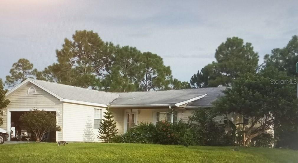 a view of a house with garden