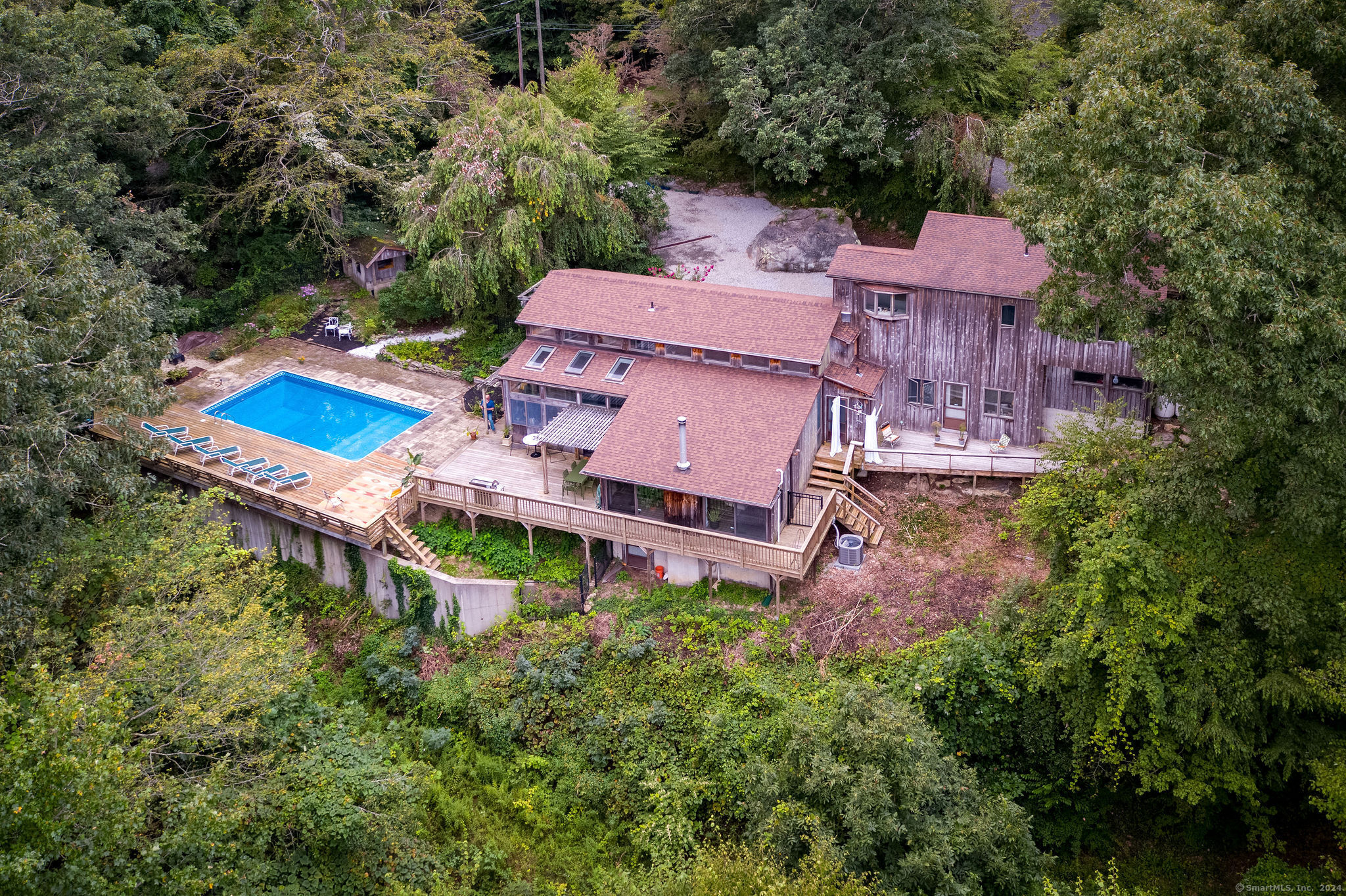 an aerial view of a house with a garden