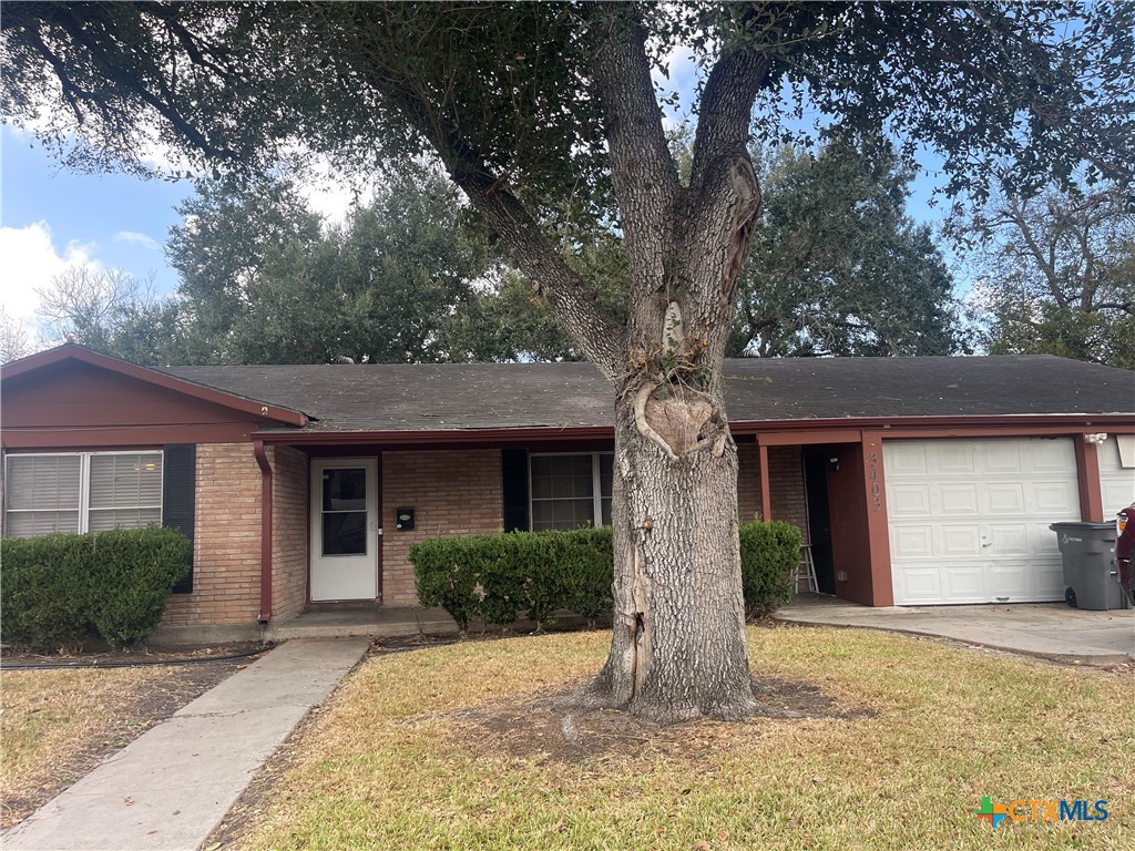 a front view of house with yard