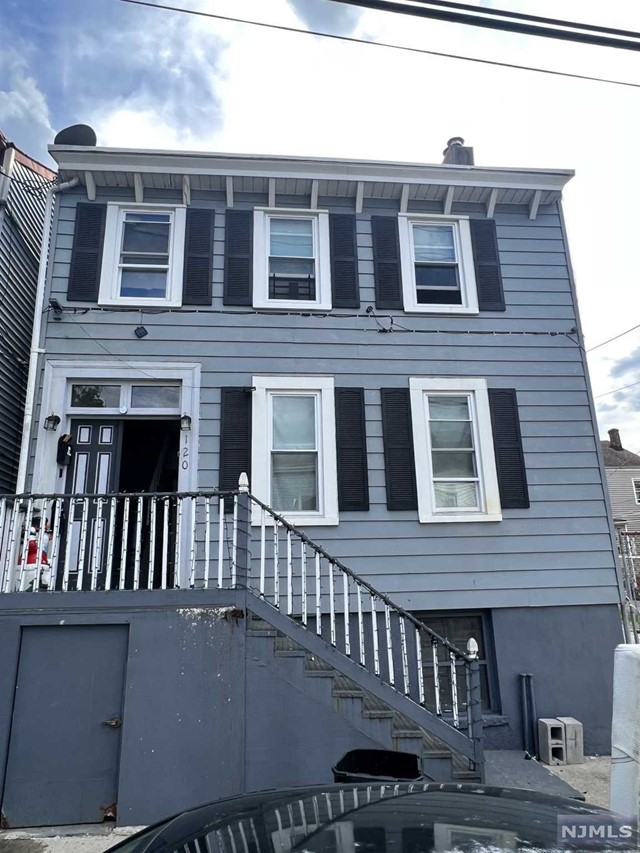 a front view of a house with balcony