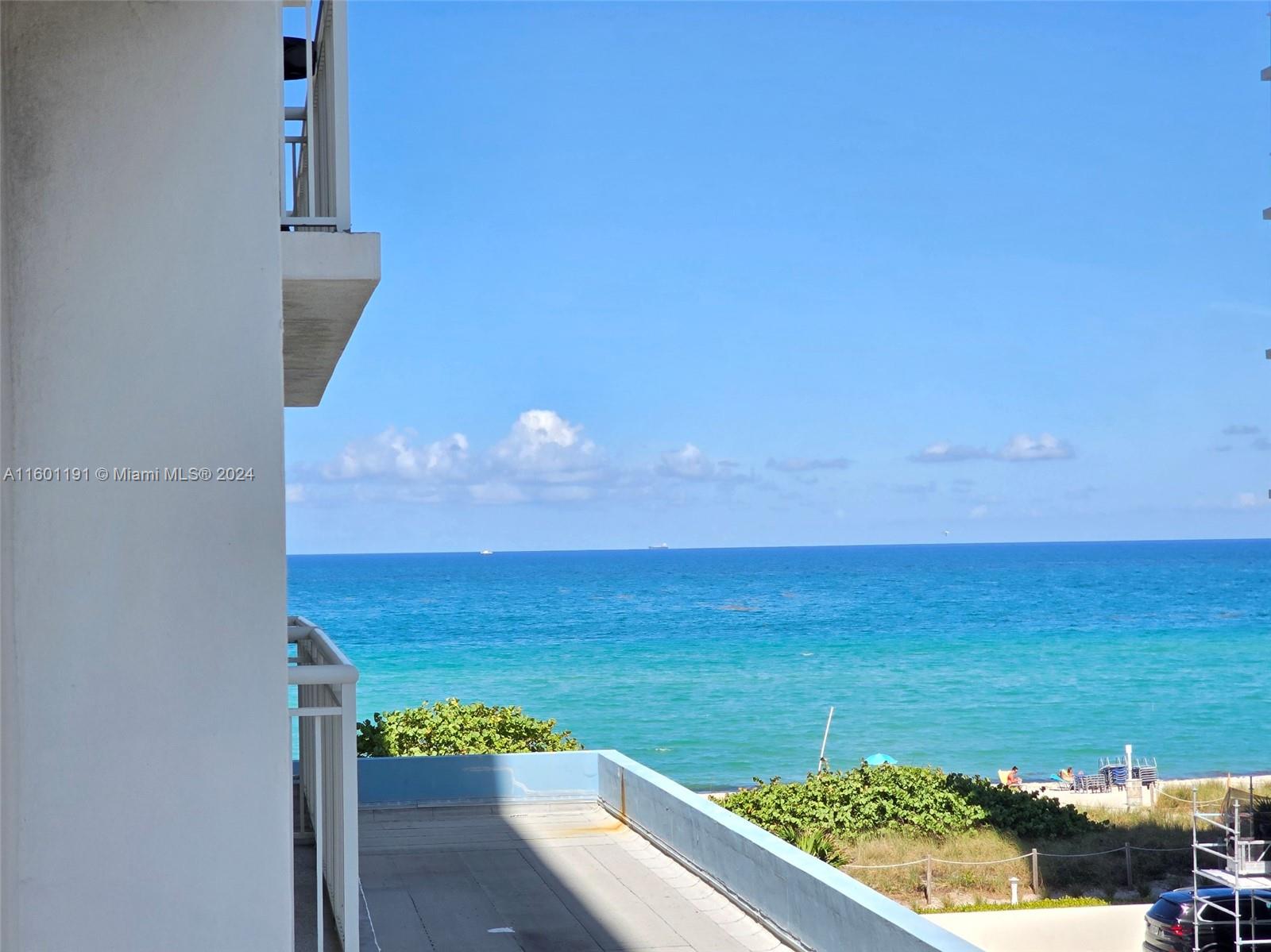 a view of an ocean from a balcony