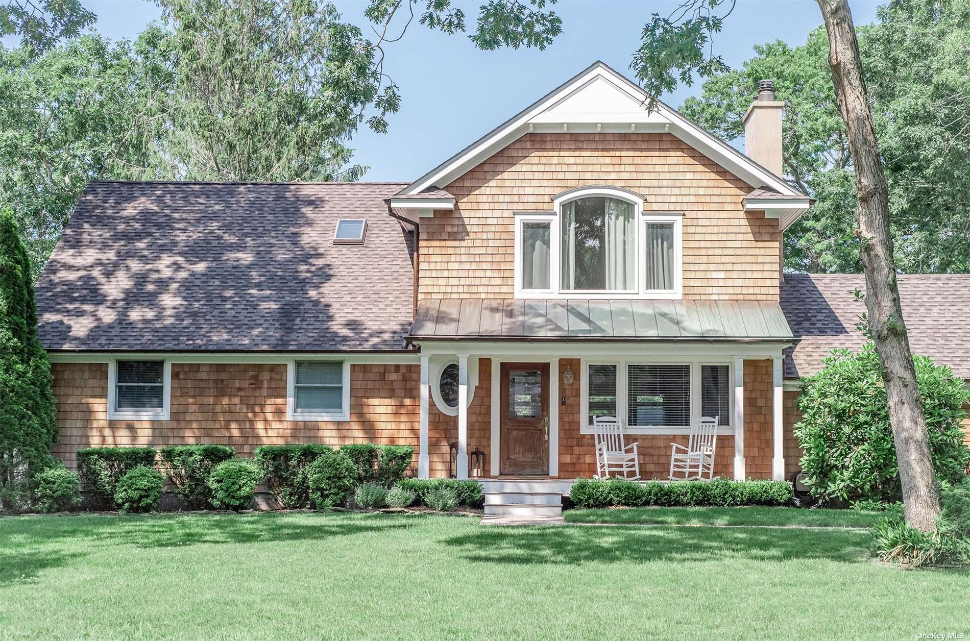 front view of a house and a yard