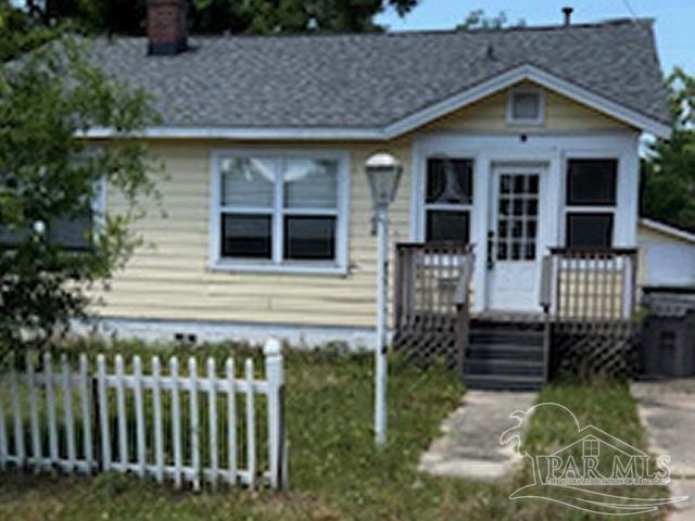 a front view of a house with stairs