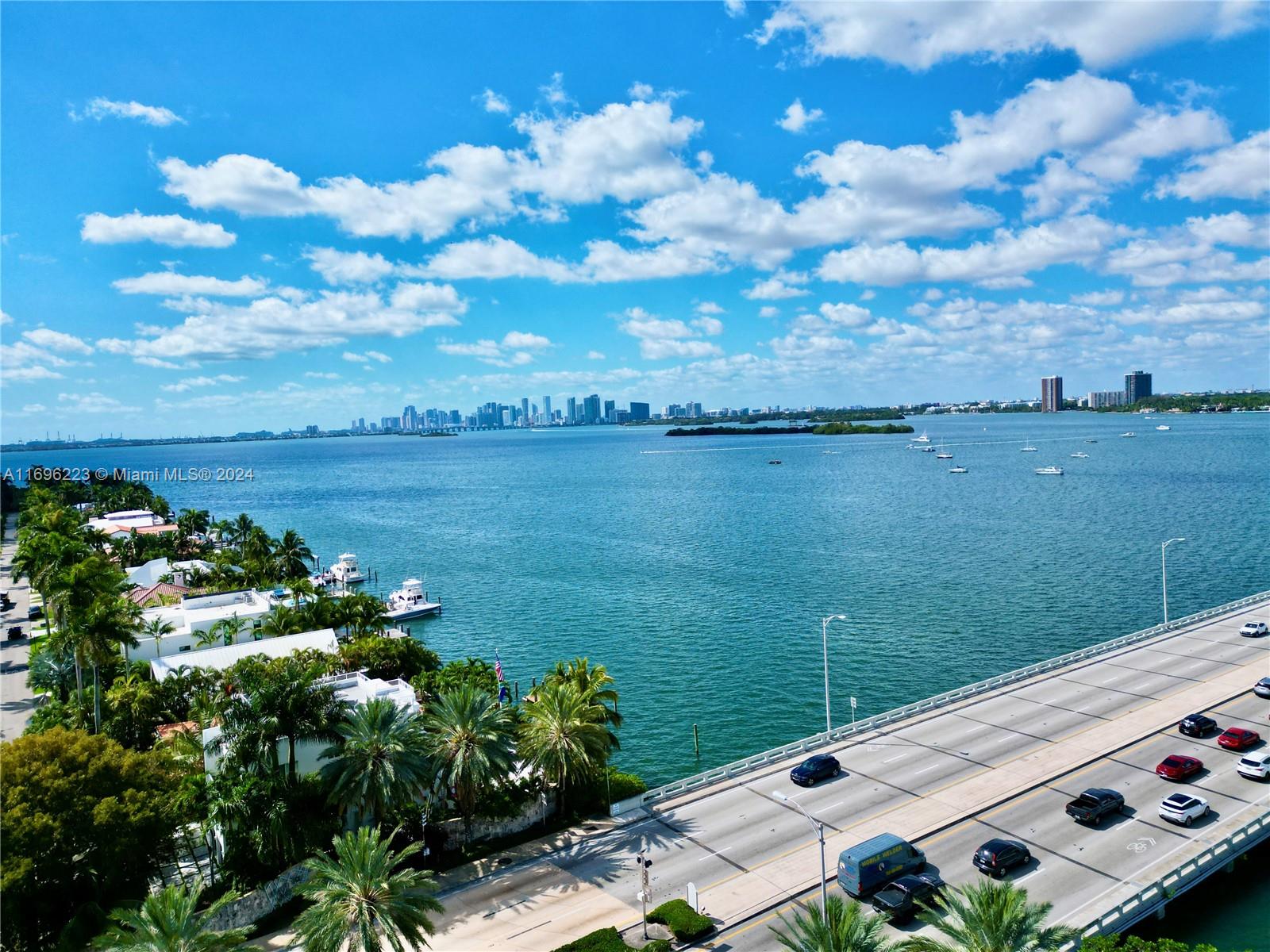 a view of a lake with a city