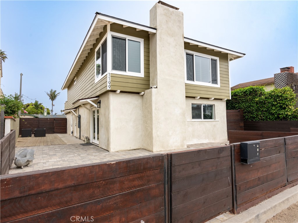 a view of house with yard