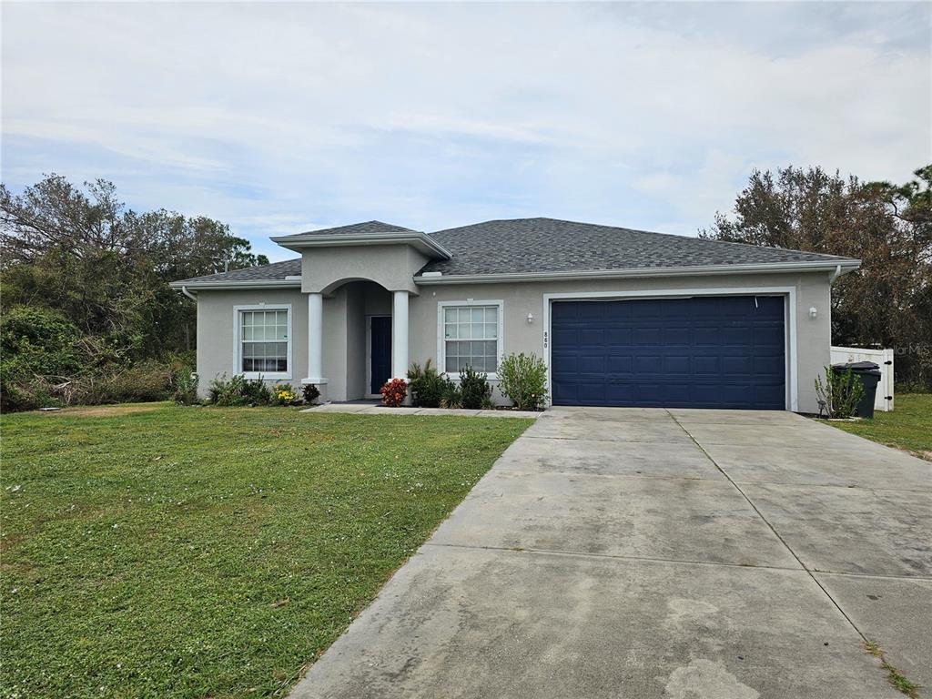 front view of house with a yard