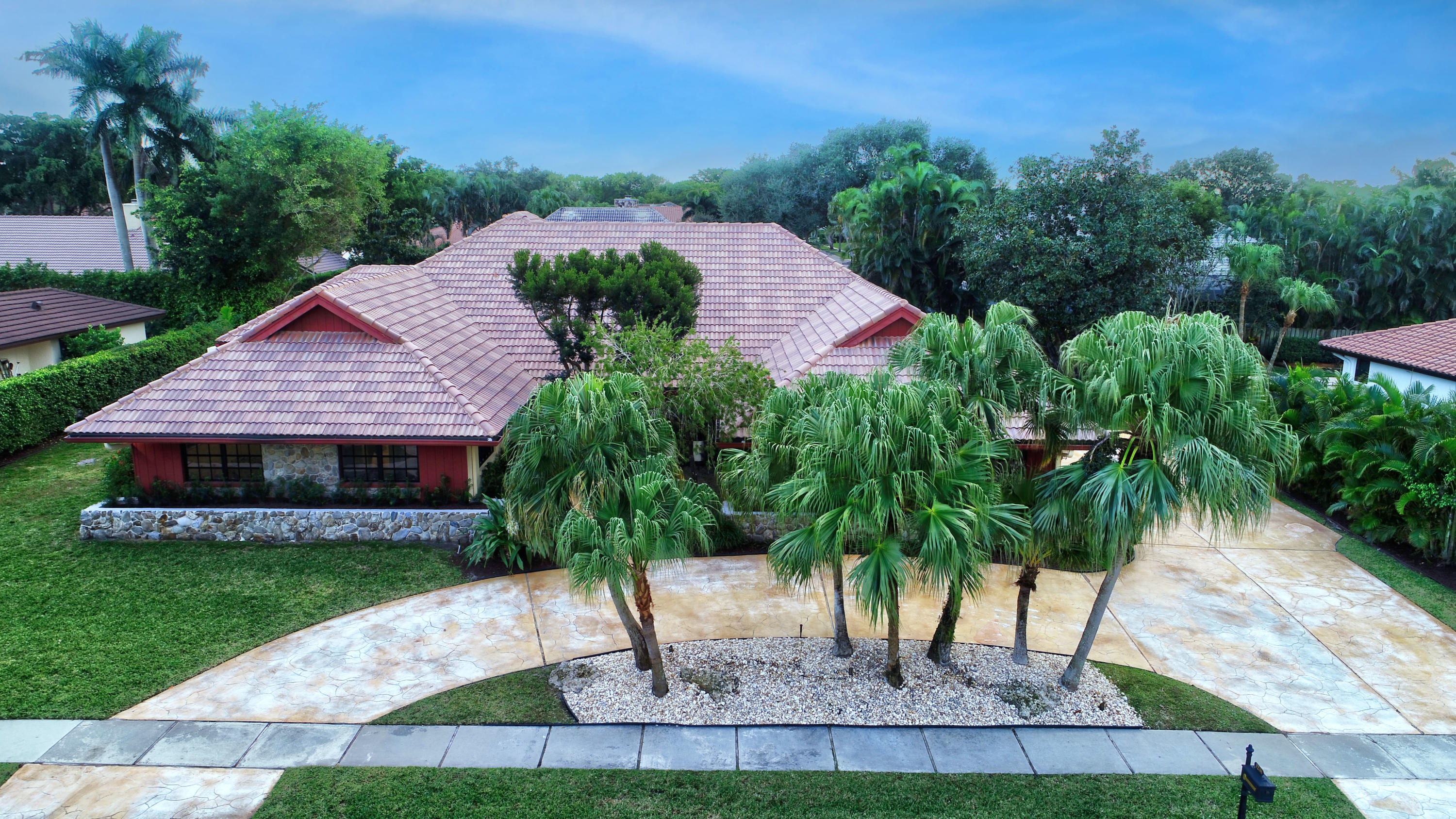 a aerial view of a house with a yard