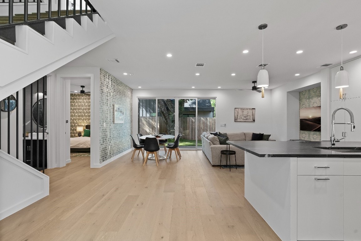 a kitchen with a sink and microwave