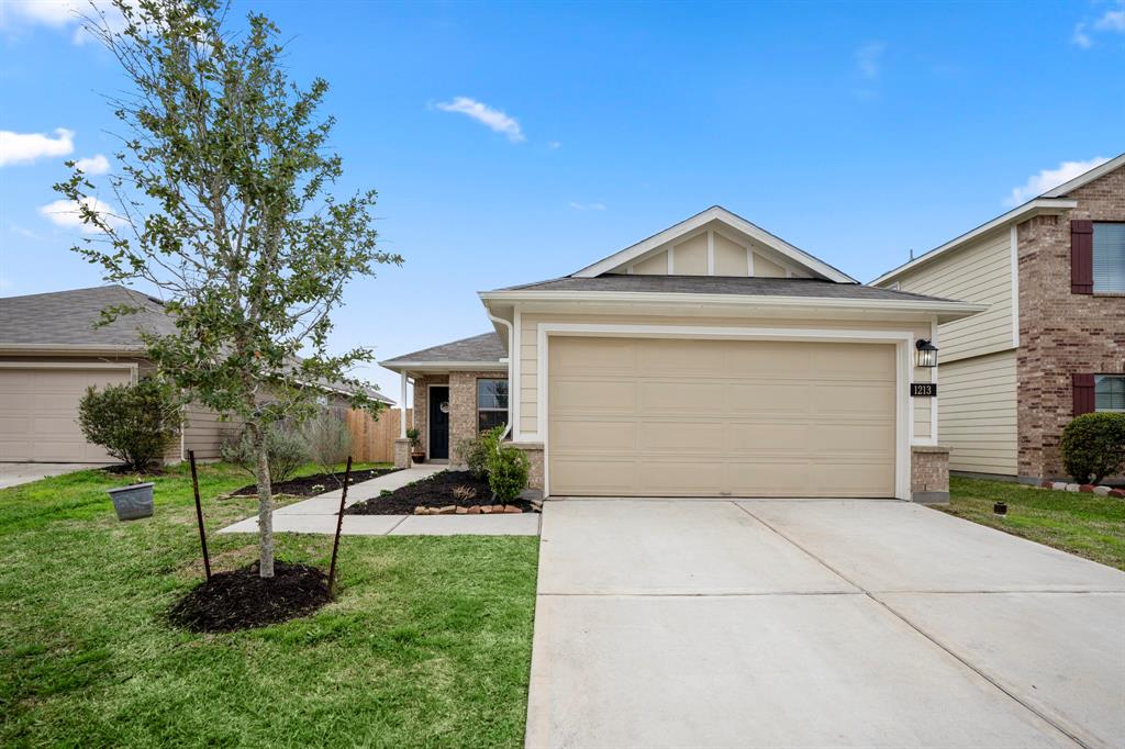 Welcome to your future home at 1213 Steed Bluff Dr in the growing community of Mustang Crossing in Alvin, TX!