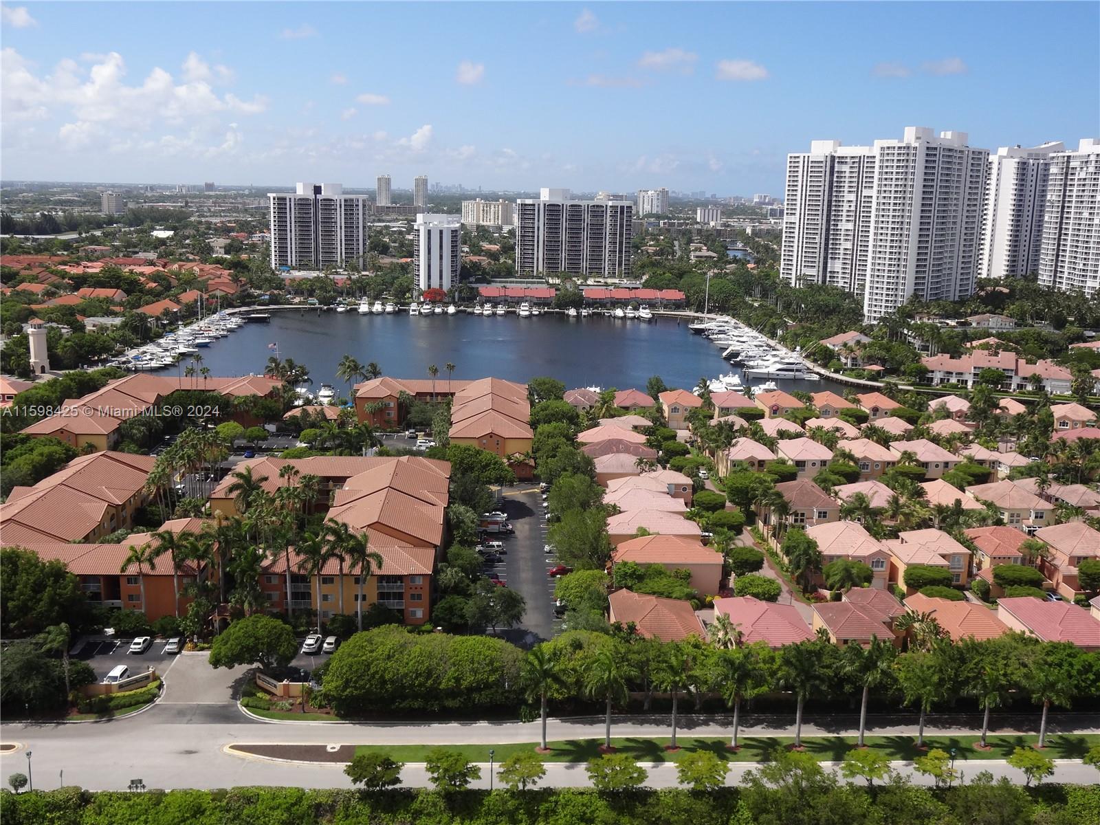 an aerial view of a city with lots of residential buildings