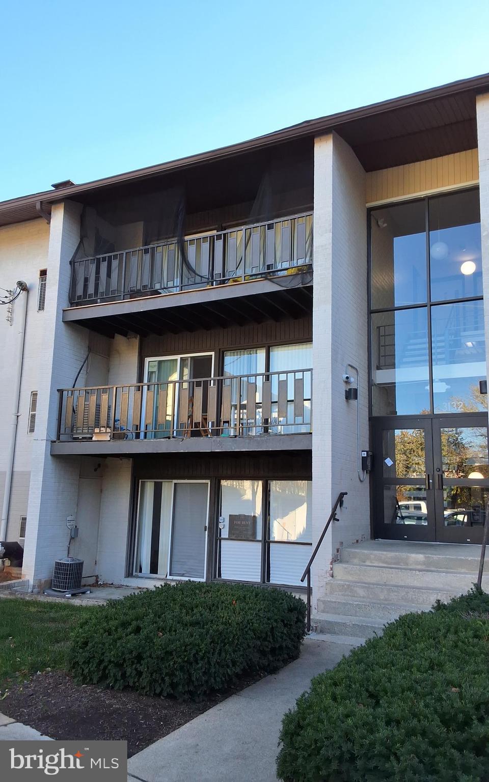 a view of building and front view of a house