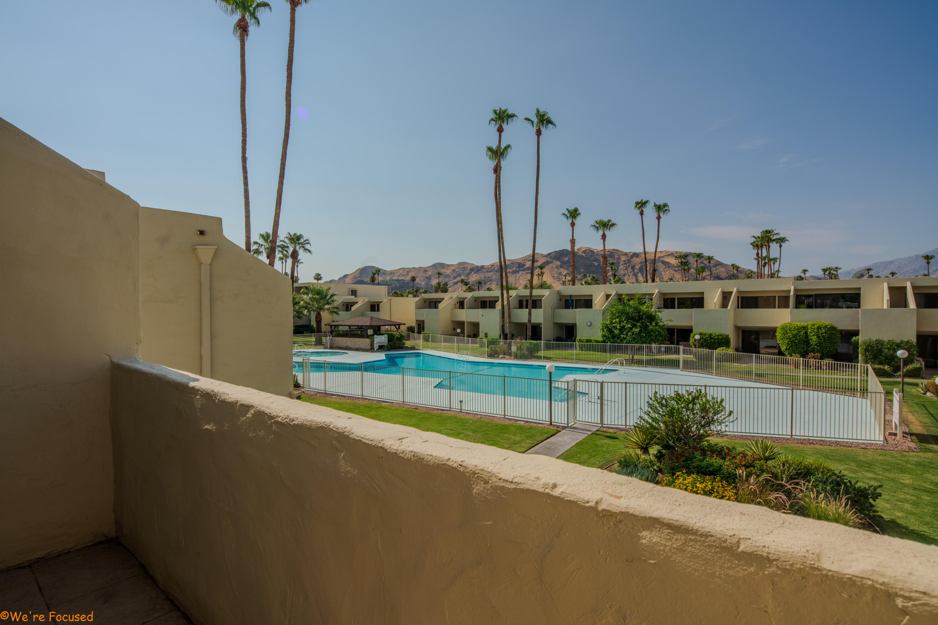 a view of a house with a swimming pool