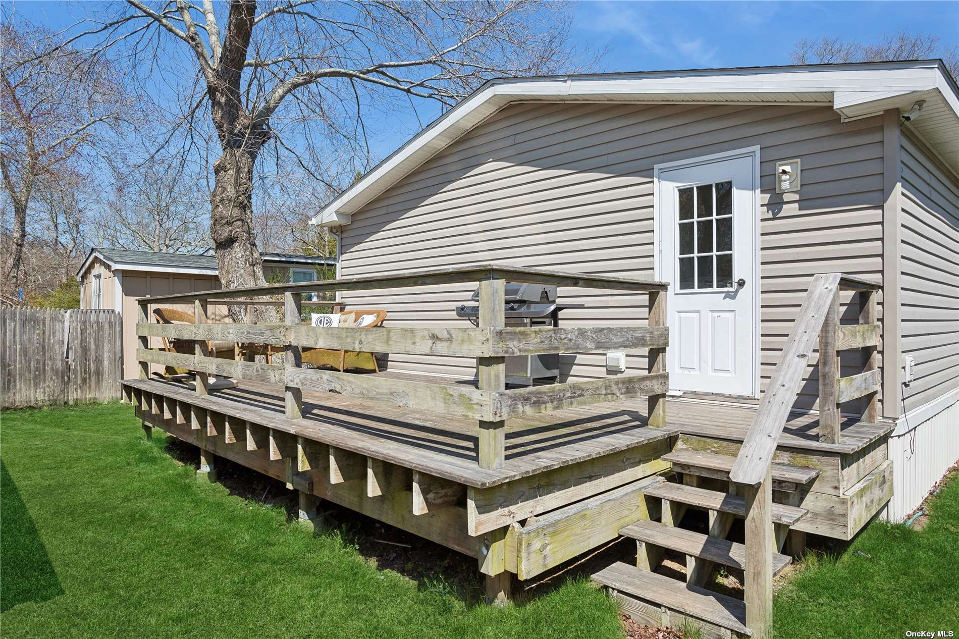 a view of a house with a big yard