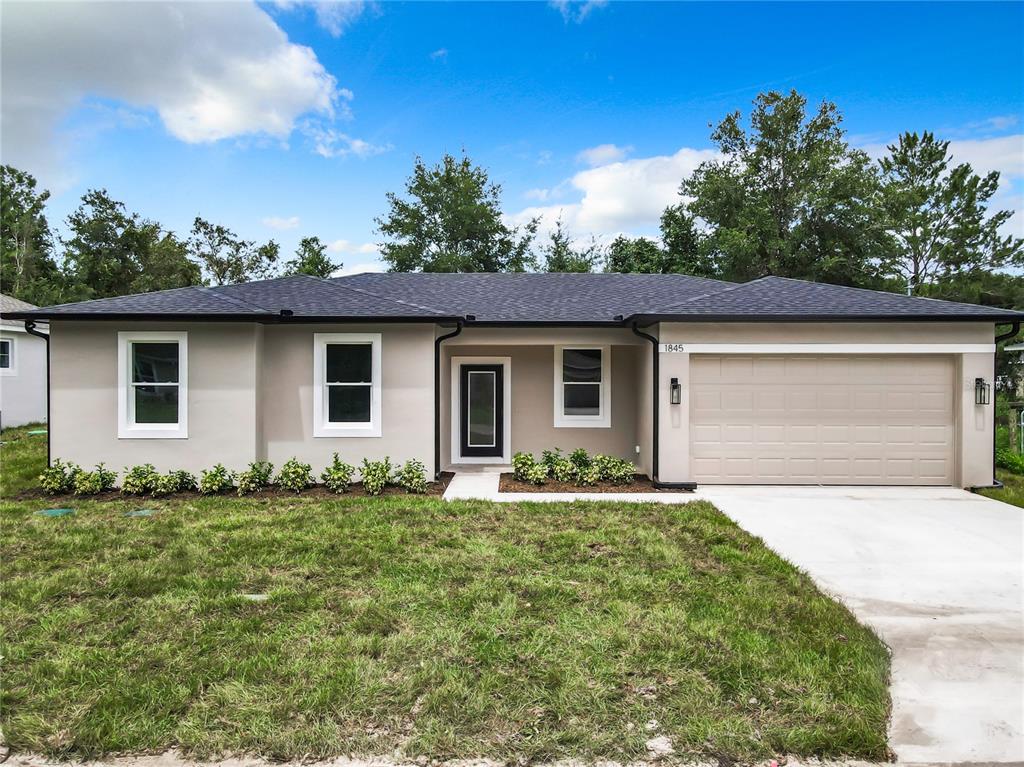 front view of house with a yard