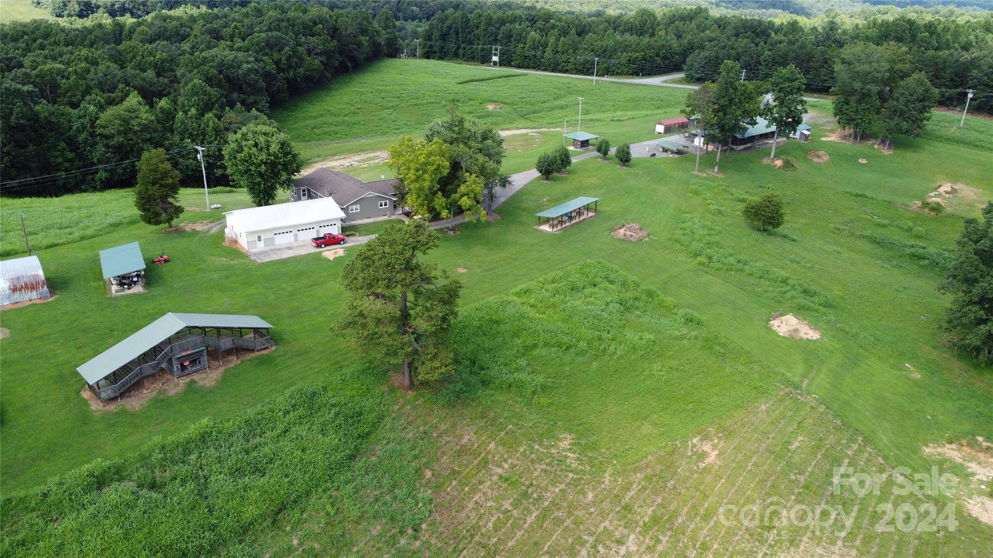 a view of a golf course with chairs