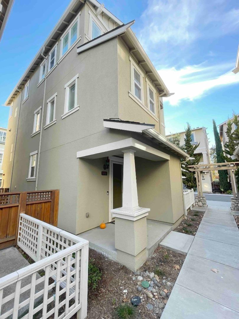 a front view of a house with parking