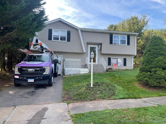 a car parked in front of a house