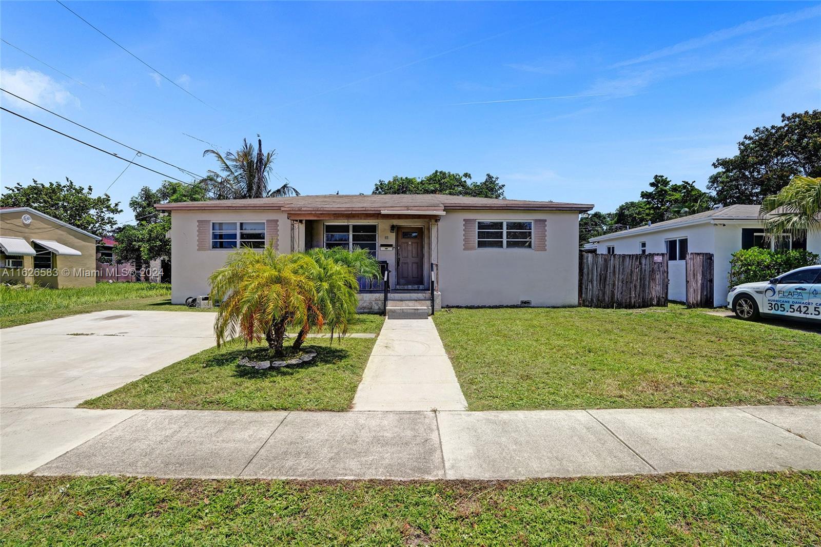 a front view of house with yard