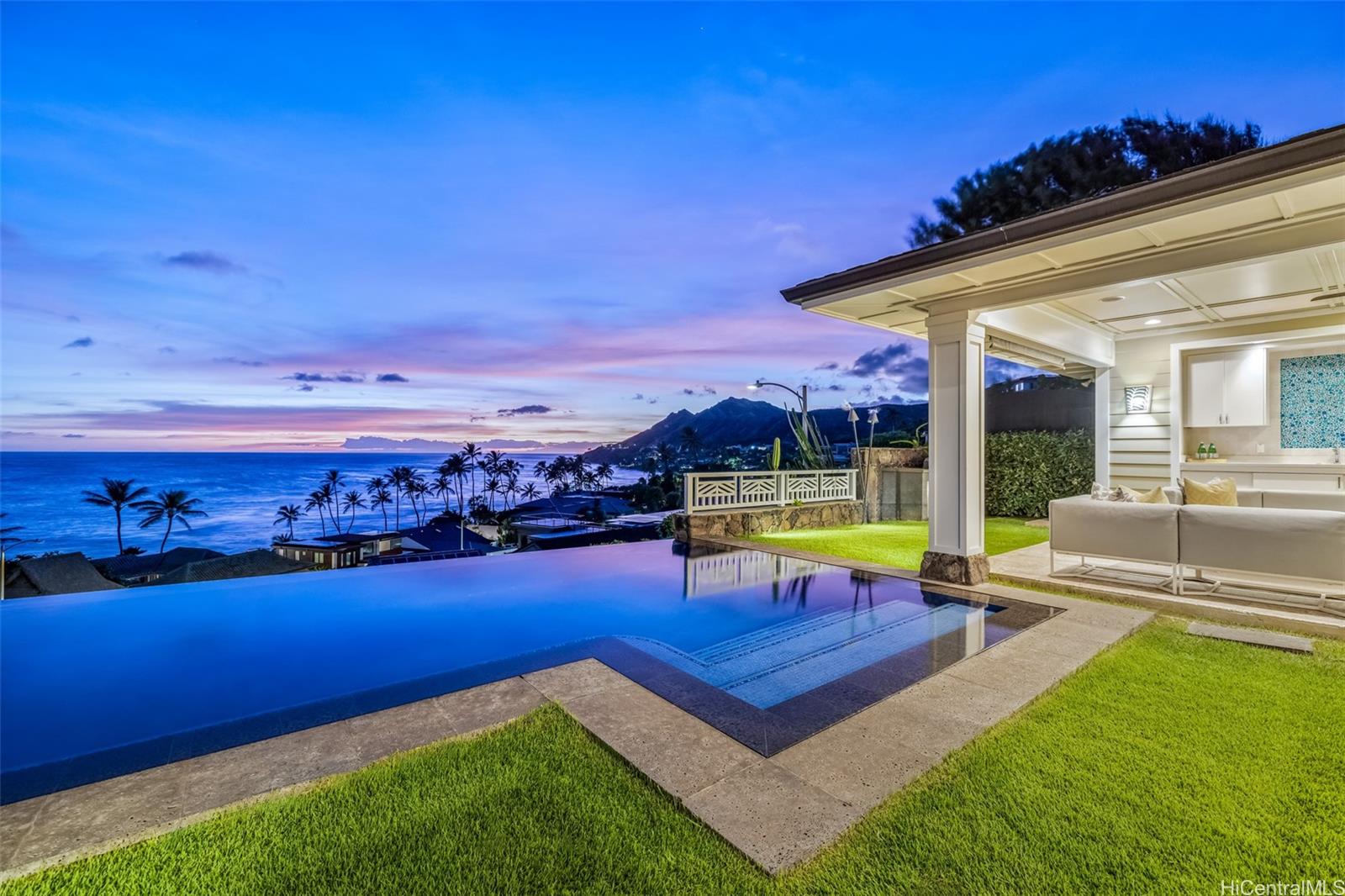 a view of a backyard with swimming pool