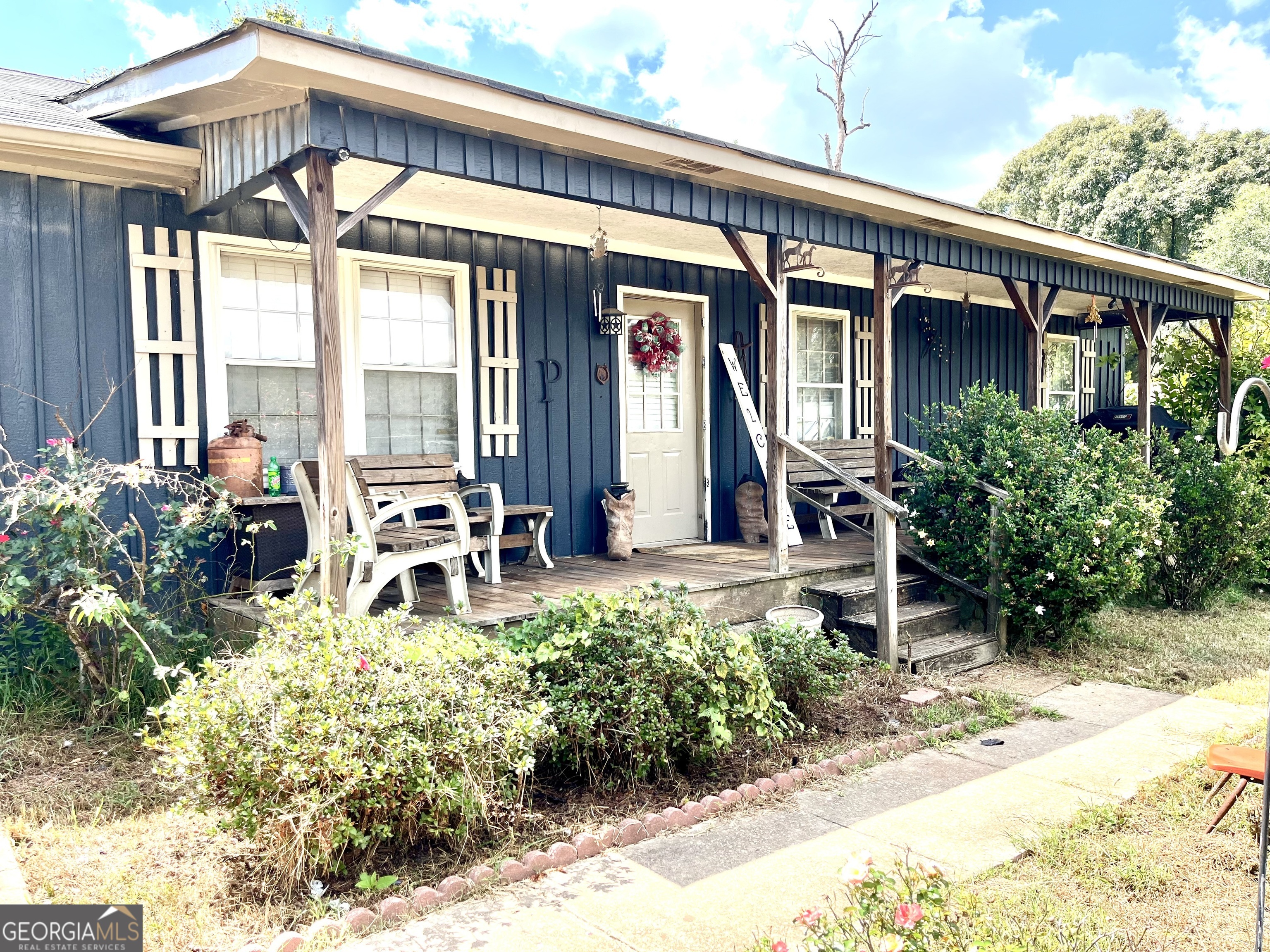 a front view of a house with patio