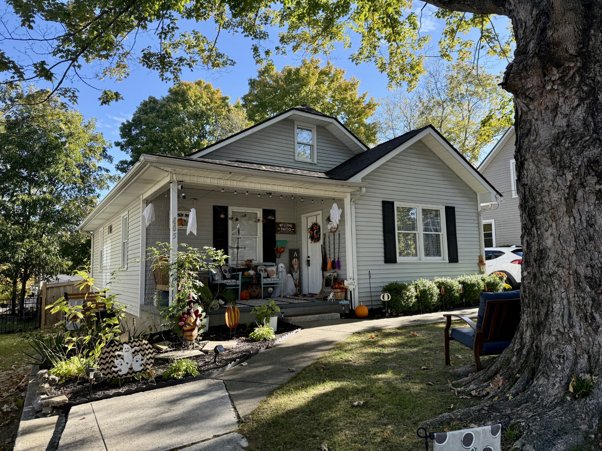 a front view of a house with garden