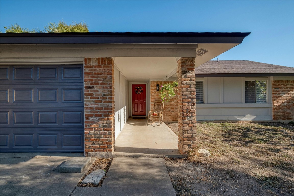 a front view of a house with a garage