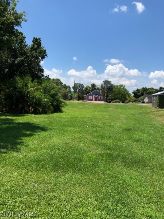 a view of a green field with sky view