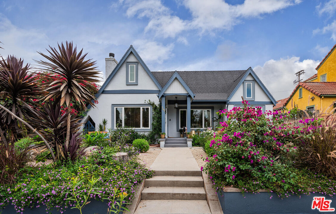 a front view of house with yard