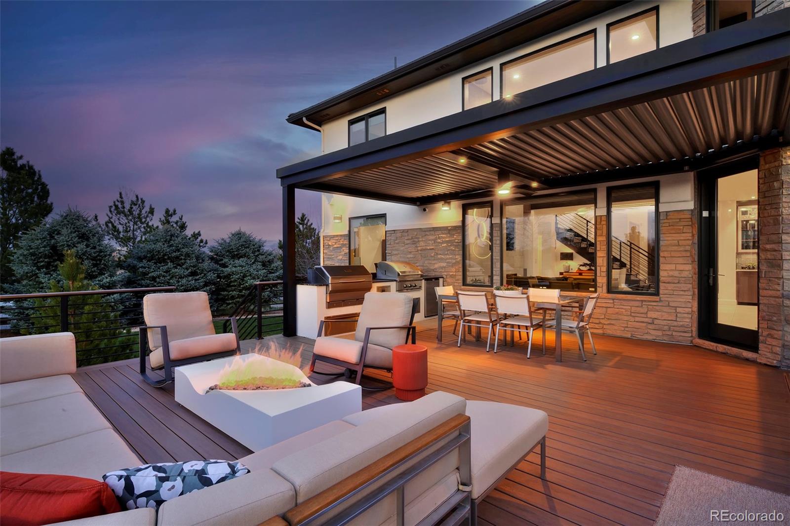 a view of a patio with chairs and a table