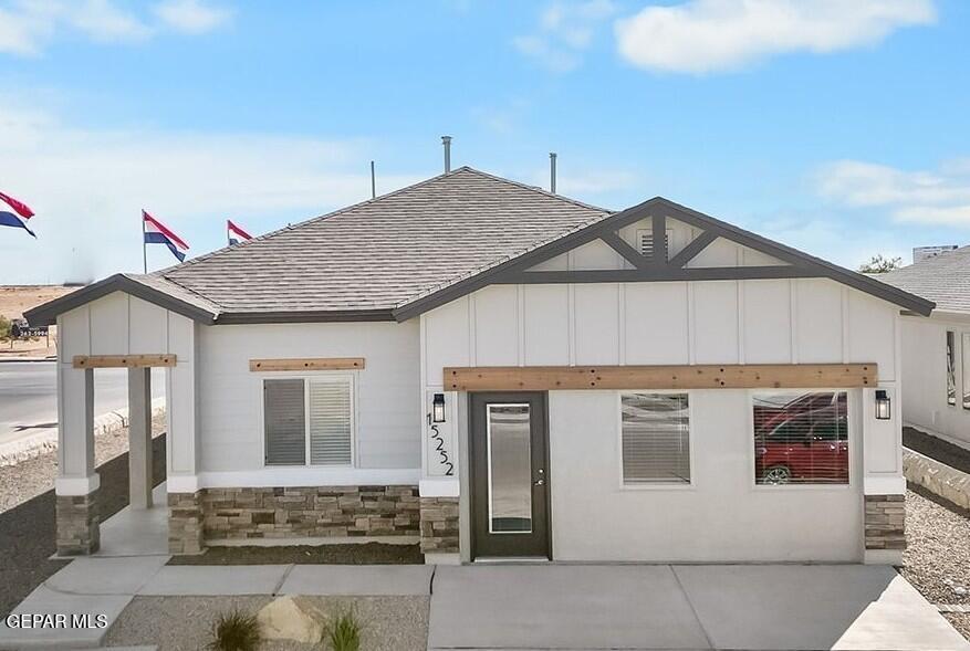 a front view of a house with a garage