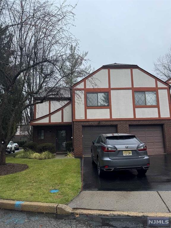 a car parked in front of a house