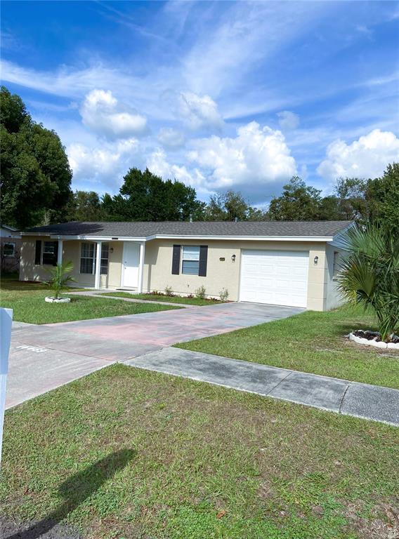 front view of house with a yard