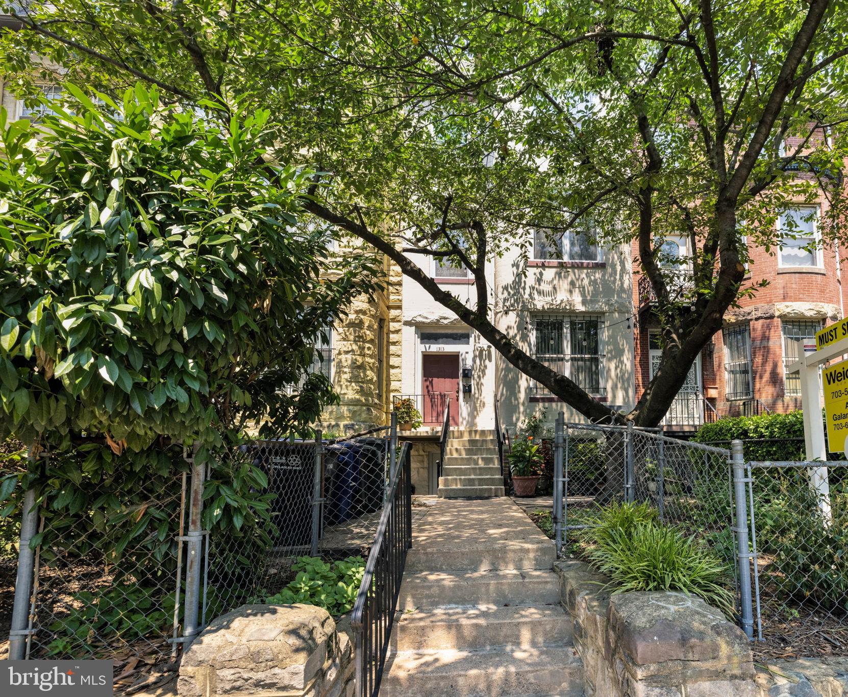 a house view with a backyard space