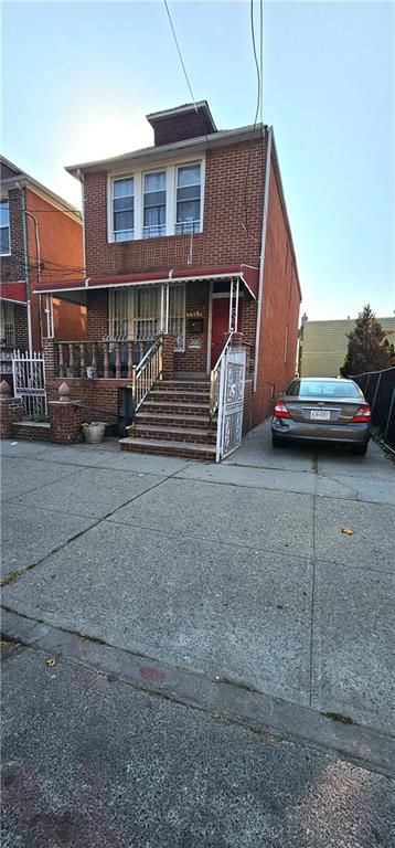 a view of a car park in front of house