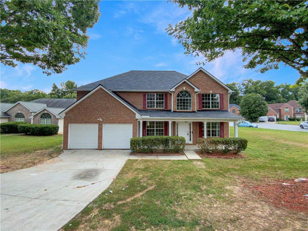 front view of house with a yard