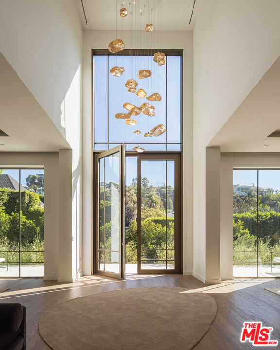 a view of a room with a large window