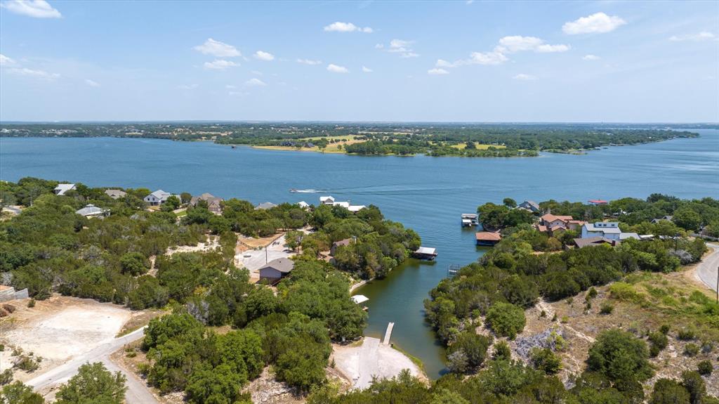 a view of a lake with a city