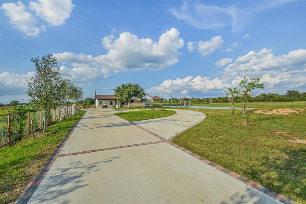 a view of a lake with a big yard