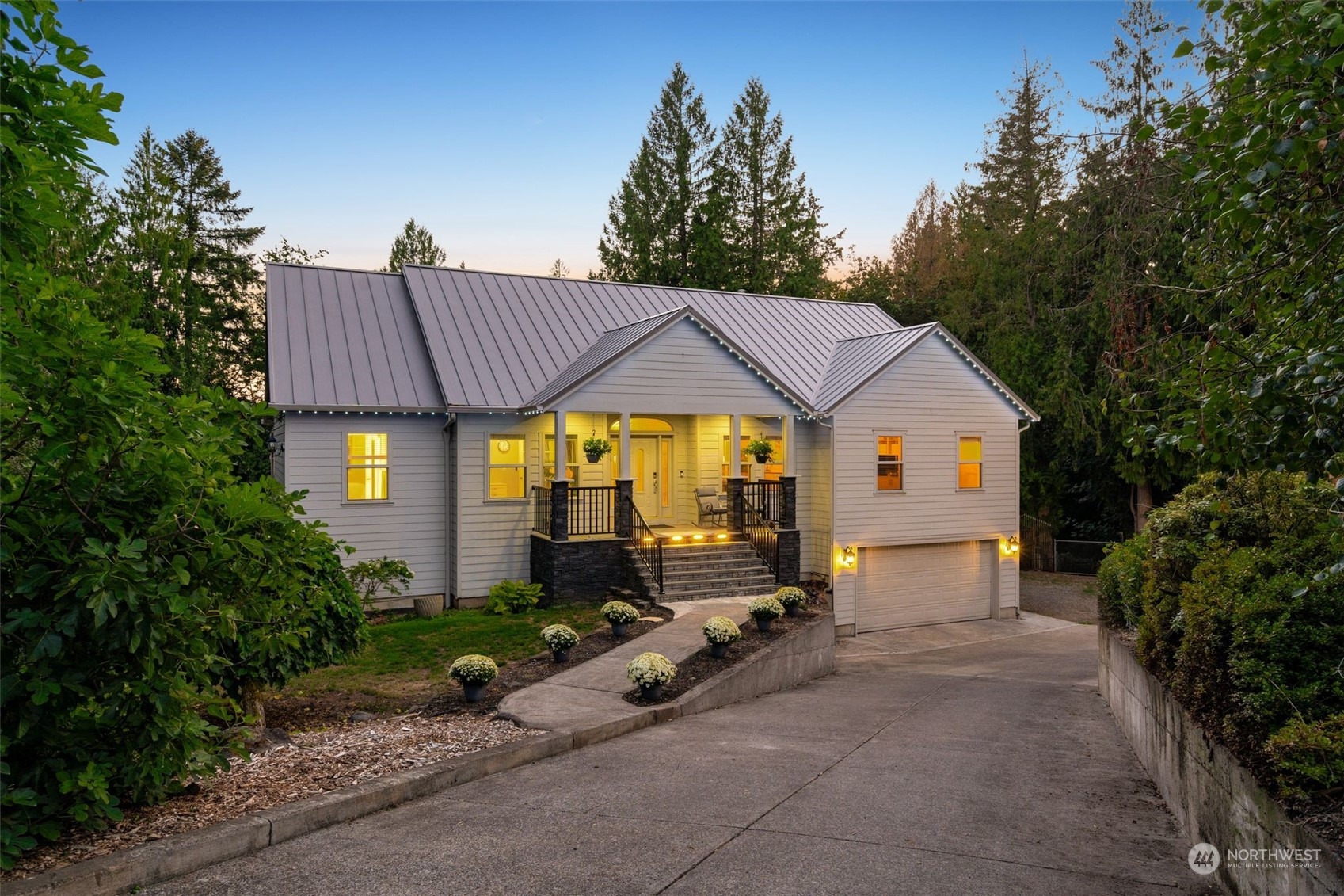 a view of house with backyard space and garden