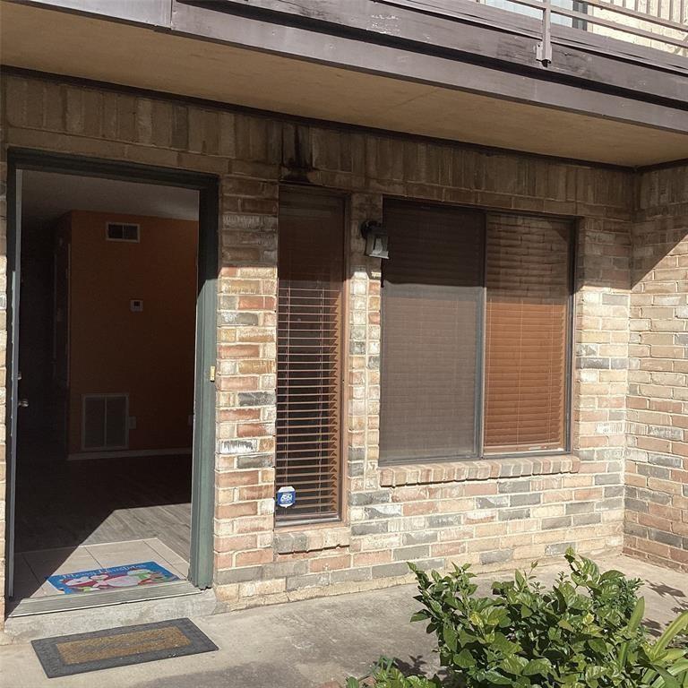 a front view of a house with a garage