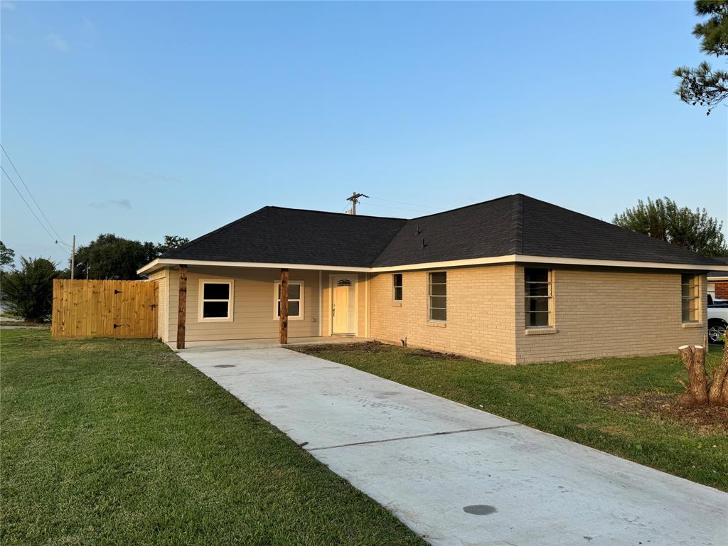 a front view of a house with yard