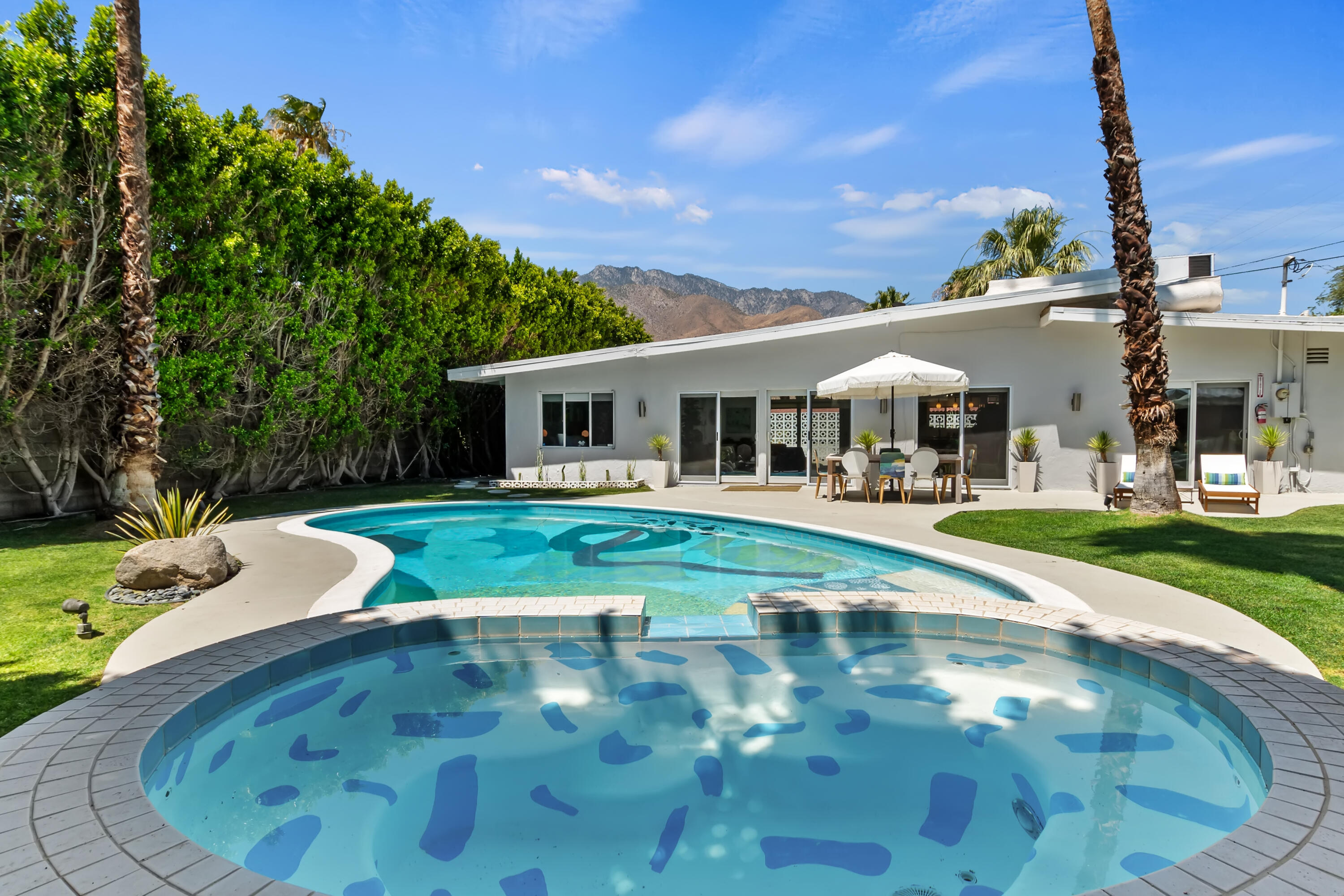 a view of pool with outdoor seating