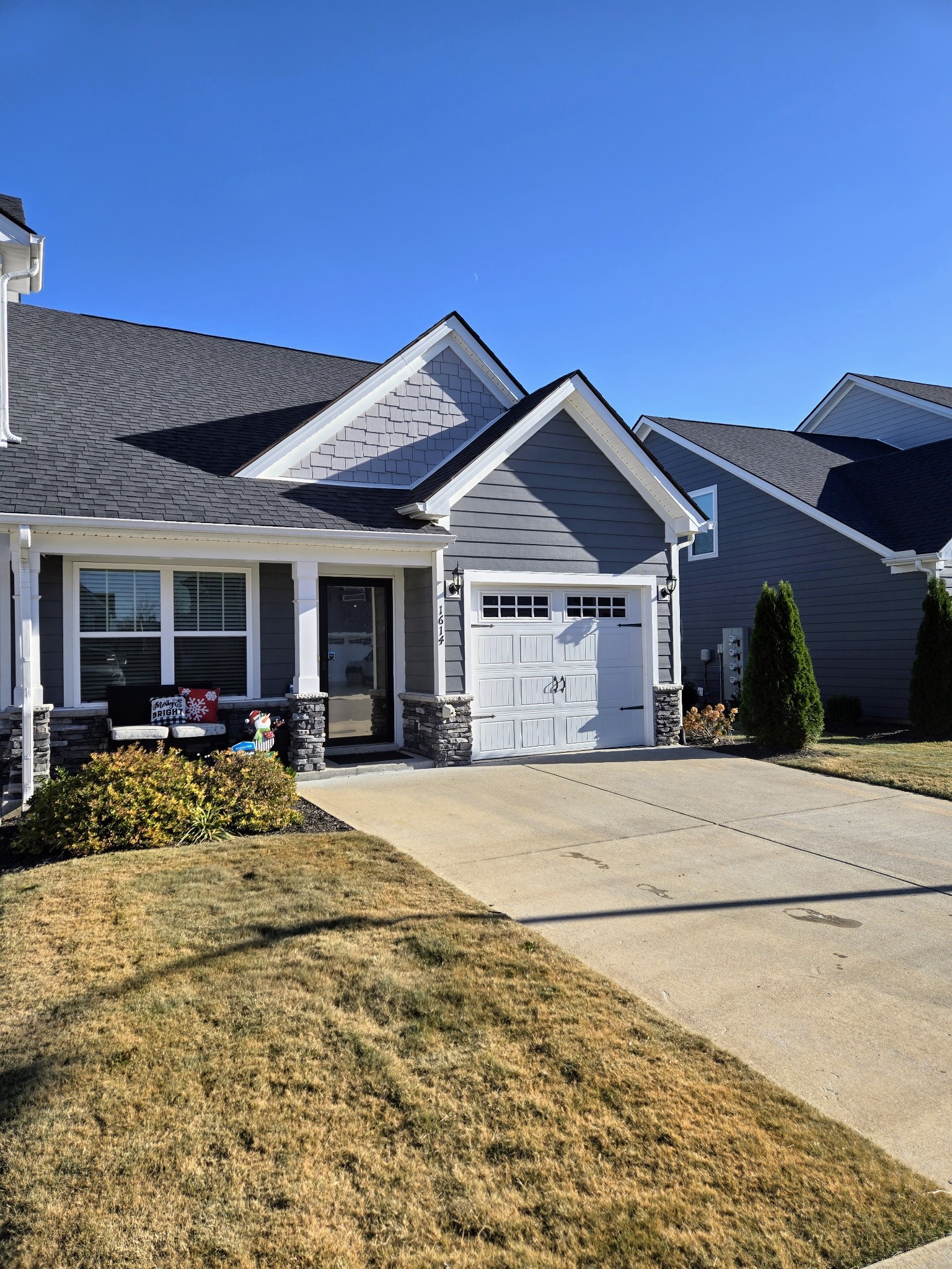 a front view of house with yard outdoor seating