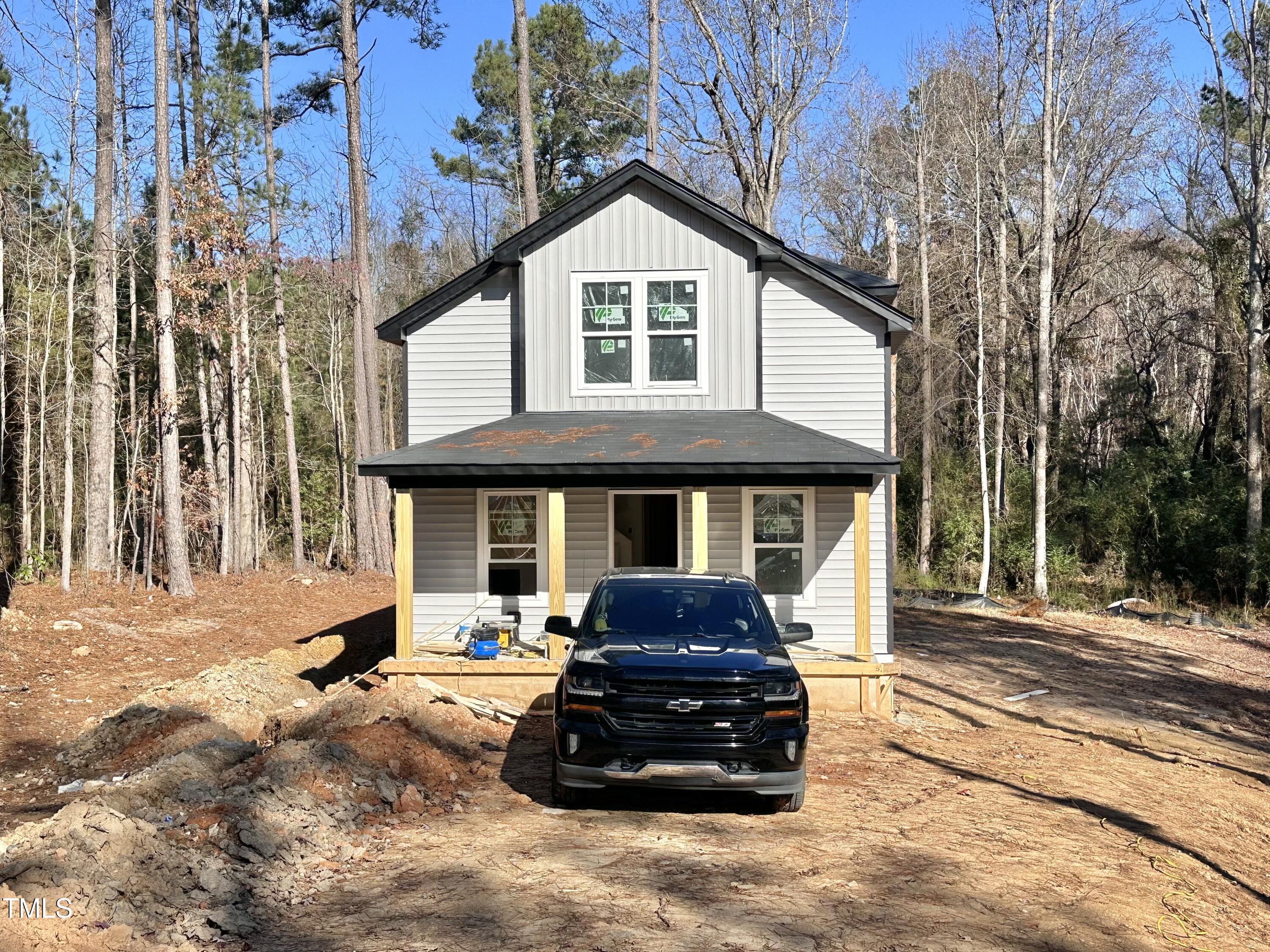 a car parked in front of a house