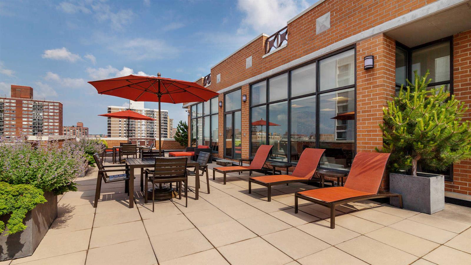 a outdoor space with lots of tables and chairs