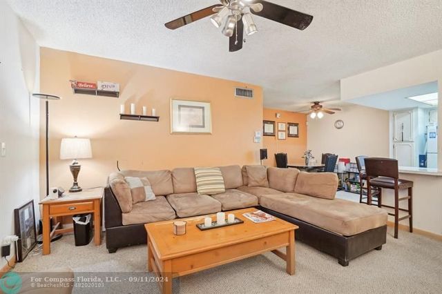 $177,000 | 8404 West Sample Road, Unit 230 | Village Green