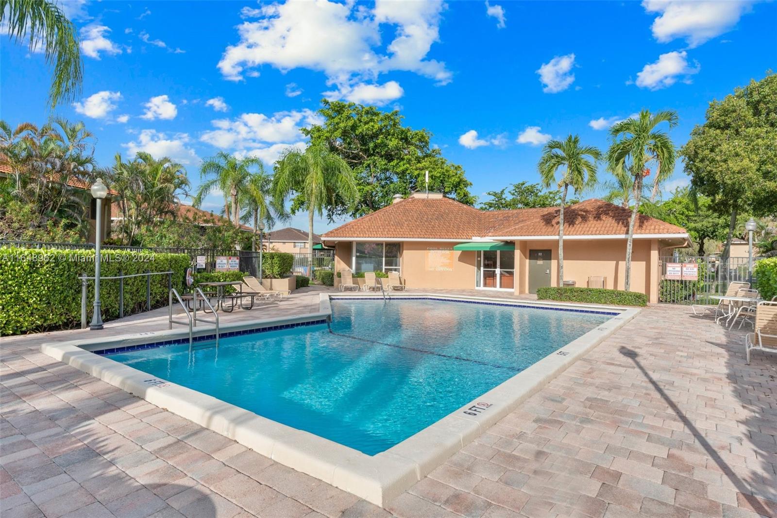 a view of a house with swimming pool