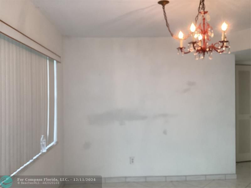 a view of a chandelier in a room