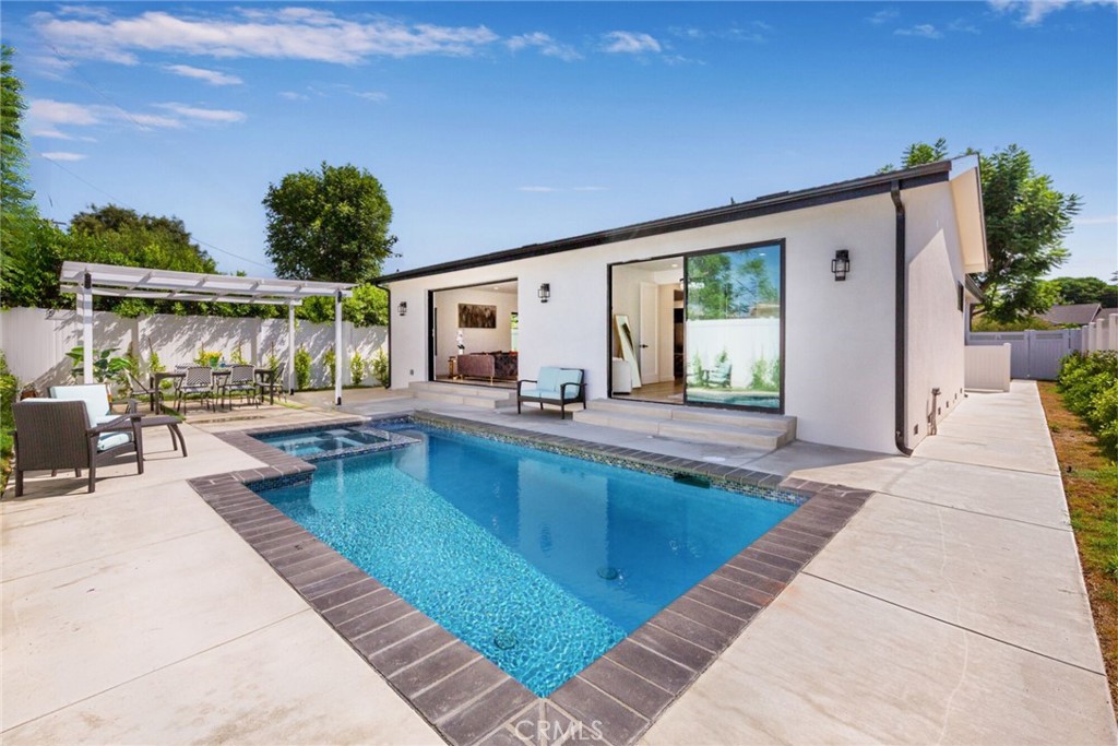 swimming pool view with seating space